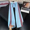 Pantalones deportivos de punto gofre estilo americano a rayas de bloques de color para hombre, corte ajustado, pierna recta, pierna ancha, pantalones casuales para otoño