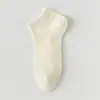 Calcetines para mujer primavera y verano finos absorbentes de sudor transpirables calcetines cortos color liso antideslizantes malla fondo de masaje invisible calcetines al por mayor
