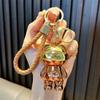 Llavero mecánico luminoso de oso, juguete galvanizado, llavero de coche, bolso, colgante, muñeca, máquina, regalo, venta al por mayor