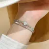 Nuevo producto transfronterizo: Pulsera de latón con incrustaciones de circonita, pulsera exquisita superbrillante de diamantes completos, accesorio de mano elegante y lujoso