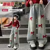 Jeans estilo coreano para primavera y otoño 2026, nuevos pantalones casuales coreanos holgados de pierna ancha, pantalones de moda y dulces con lazo