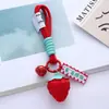 Llavero de cuerda de mano con colgante de fresa al por mayor, problemas y cosas buenas suceden, decoración de bolsa de regalo pequeña de fresa de moda en internet