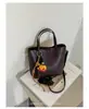 Bolsa pequena super popular para o trabalho, feminina, nova coleção outono 2026, estilo Maillard, bolsa de ombro, transversal, tipo balde para o dia a dia
