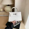 Design de Nicho Pingente de Estrela Bolsa Kelly Feminina 2026 Primavera Nova Leve Luxo Para o Trabalho Sensação de Alto Padrão Bolsa de Ombro Único Transversal