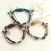 Pulsera de Cerámica Vintage Jingdezhen, Estilo Étnico Trenzado con Cuerda y Perlas, Joyería Hecha a Mano para Mujer con un Toque de Lujo Discreto