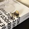 Blogger de Corea del Sur con anillo de armadura retro dorado y plateado versión ancha ins sentido de personalidad de alta gama exagerado anillo plegable femenino