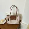 Bolso de axila de moda para mujer 2026 nuevo de verano de alto valor bolso de hombro simple de gran capacidad bolso tote casual para el día a día