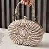 Nova Bolsa de Mão Redonda de Metal com Pérolas e Strass Bordados à Mão Estilo Europeu e Americano Bolsa para Vestido Produto Novo Transfronteiriço Souvenir