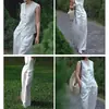 En stock al por mayor del fabricante 2026 nuevo diseño de moda para mujer, tapeta diagonal, cuello en V, chaleco blanco casual