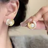 Estilo Caliente 2025 Pinzas para Oreja sin Perforar para Mujer, Flores de Camelia, Estilo Francés, Suave Elegante, Dulce Joyería para Oreja Fabricante Mayorista