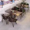 Juego de mesa y sillas retro en estilo industrial para bares, restaurantes occidentales, mesas de comedor para cafeterías, tiendas de té de leche, snack bars y restaurantes de barbacoa