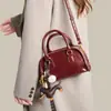 Bolso Pequeño Simple Retro para Mujer 2026 Primavera y Verano Nuevo Estilo Bolso Cuadrado Pequeño de Mano Bolso Cruzado Versátil de Textura Nueva y Elegante