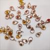 Colgante de gota de agua con borde de cobre de resina multicorte, transparente, flor seca, aproximadamente 14 x 21 mm, para hacer pendientes y collares hechos a mano.