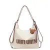 Bolso Tote de Hombro Retro Casual de Gran Capacidad Nuevo Versátil para Viajes Commuter Tendencia Bolso de Temperamento Bolso Cruzado de Viaje para Mujer