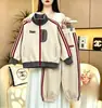 Conjunto Esportivo Masculino e Infantil Outono 2026 Novo Estiloso Estilo Coreano Blusa de Manga Longa Conjunto de Duas Peças Color Block Infantil de Outono