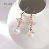 Nuevos Pendientes de Perla Pendientes Dobles de Cisne con Corazón para Mujer Pendientes de Aguja de Plata de Ley 925 Chapados en Oro Real Pendientes de Alta Gama