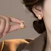 Pendientes Grandes Marrones Estilo Retro de Hong Kong para Mujer Pendientes de Alta Gama 2025 Nuevo Estilo Popular Pendientes de Aro Lisos