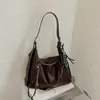 Bolso tote retro de gran capacidad, nuevo diseño minimalista 2026, bolso de hombro de estilo relajado, mochila casual de moda y con textura