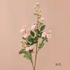 Flor artificial de rosa única estilo nórdico, disponible en stock, adecuada para accesorios de fotografía de bodas y decoración de hoteles de lujo ligero.