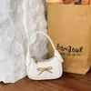 Bolsa Versátil Estilosa com Laço para Mulheres, Versão Coreana, Mini Acessório Fofo e da Moda de Nicho, Bolsa de Mão para Meninas Estilo Chanel