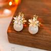 Pendientes de moda con hebilla de oreja de piedra de ojo de gato y flor de doble cara de Widney Niche Design Sense, elegantes pendientes que combinan con todo.