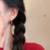 Pendientes de Abalorio Caballo Mecedora Calabaza Roja Diseño de Nicho Pendientes de Lujo Accesible Pendientes de Gama Alta Otoño e Invierno Elegante