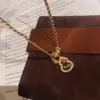 Colar de Zircônia Banhado a Ouro Real Pedra Olho de Tigre Cabacinha, Corrente de Clavícula Estilo Nicho de Luxo Leve, Joias Melard para Mulheres com Toque de Alto Padrão