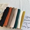 Tejido de punto estilo coreano para niñas 23 nuevo otoño e invierno suéter de cuello alto con orejas de madera versátil camiseta básica para bebé 0158A022