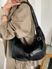 Bolsa de Mão Feminina Nova de Outono 2026 Estilo Vintage Nicho Bolsa de Ombro Transversal Bolsa de Bolinho Elegante de Alta Qualidade