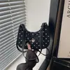 Bolso de mano de moda estilo coreano con lazo de lunares para mujer, nuevo diseño de nicho transfronterizo, versátil bolso cruzado para el hombro y debajo del brazo para el día a día
