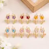 Pendientes transfronterizos de moda: Aretes de tulipán con una estética vintage y fresca, con delicados diseños de flor de tulipán, material de cobre y circonita cúbica microincrustada