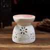 Comercio Exterior Transfronterizo Cerámica Hueca Tallada Hogar Estufa de Aromaterapia Dormitorio Sala de Estar Lámpara de Aromaterapia con Velas Aceite Esencial Cerámica Creativa