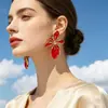 Pendientes florales de moda, versátiles, elegantes y exagerados, de venta cruzada en Amazon Europa y América, adecuados para mujeres, al por mayor