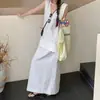 Estilo perezoso top sin mangas cuello en V cordón falda casual mujer 2026 verano nuevo conjunto de moda chic