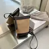 Bolso de mano retro de gamuza para mujer para otoño e invierno, nuevo bolso tipo cubo elegante y versátil 2026, bolso cruzado casual de nicho para el día a día