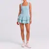 Saia curta sexy de peça única transparente com bojo removível, justa ao corpo, com bolsos, para corrida, esportes, fitness, tênis