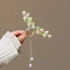 2026 Novo Estilo Primavera Flor de Lírio do Vale Borboleta Franja Presilha de Cabelo, Presilha de Tubarão Exquisita para a Parte de Trás da Cabeça, Acessório de Cabelo de Alta Qualidade