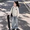 Conjunto Versátil de Dos Piezas para Niños 2026 Primavera/Otoño: Sudadera con Capucha de Retazos a Cuadros y Jeans con Estrellas de Moda Conjunto de Moda