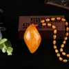 Corrente de suéter longa de cera de abelha antiga direta da origem moda Coringa pingente de âmbar amarelo de cera de abelha colar atacado
