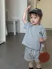 Ropa de Verano para Niños Estilo Coreano Ropa para Niños Ropa para Bebés 2026 Nuevo Estilo Traje de Camiseta de Manga Corta y Shorts para Niños Venta al por Mayor Personalización