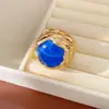 Anillo abierto de resina hueca con textura vintage, sensación exclusiva de nicho, joyería exagerada retro para mujer