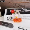 Gato de la Suerte de Año Nuevo Botella Flotante Rellena de Aceite Llavero Arena Líquida Llavero de Coche Colgante para Mochila Regalo Pequeño