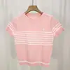 Toma real en stock suéter de rayas de manga corta retro coreano versátil para mujer popular primavera y verano top holgado ajustado moda