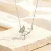 Exquisito Collar Nuevo con Lazo Microincrustado de Circonita, Sensación de Lujo Ligero y Gama Alta, Dulce Diseño de Nicho con Circonita, Colgante Versátil