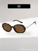 Novos óculos de sol americanos retrô de armação pequena oval com design torcido inspirado na Chanel, oferecendo um visual de luxo leve e elegante, adequados para viagens de carro à beira-mar e uso versátil