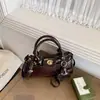 Bolsa transversal de ombro único casual fashion elegante de cor sólida simples nova para 2026, bolsa de mão simples popular e bolsa de axila