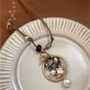 Collar con Colgante de Pluma Larga de Doble Capa Estilo Zen Retro con Cordón de Cuero para Mujer Estilo Bohemio Nuevo Estilo Chino Estilo Étnico Accesorios