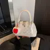 Bolso Único de Lunares 2026 Primavera Nuevo Elegante Bolso Concha Moderno Cruzado Bolso para Labiales para Salir
