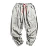 Pantalones casuales de lino y algodón holgados de color liso con hebilla estilo chino para hombre, talla grande, pierna pequeña