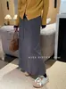 Saia de tricô listrada estilo francês com fenda traseira para mulheres, nova saia reta casual elegante versátil de cintura elástica para outono e inverno